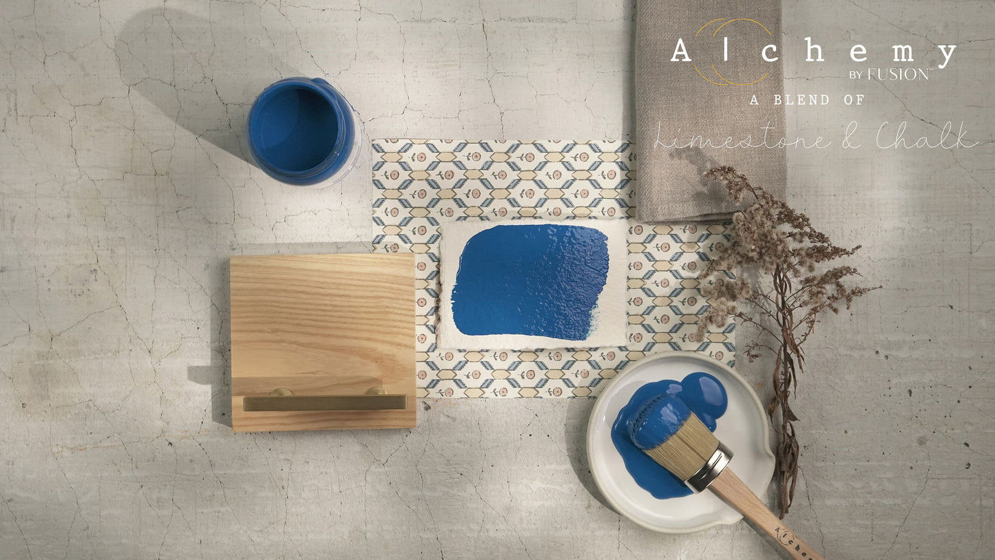 A jar of Alchemy by Fusion chalk paint in blue color, labeled Ocean.