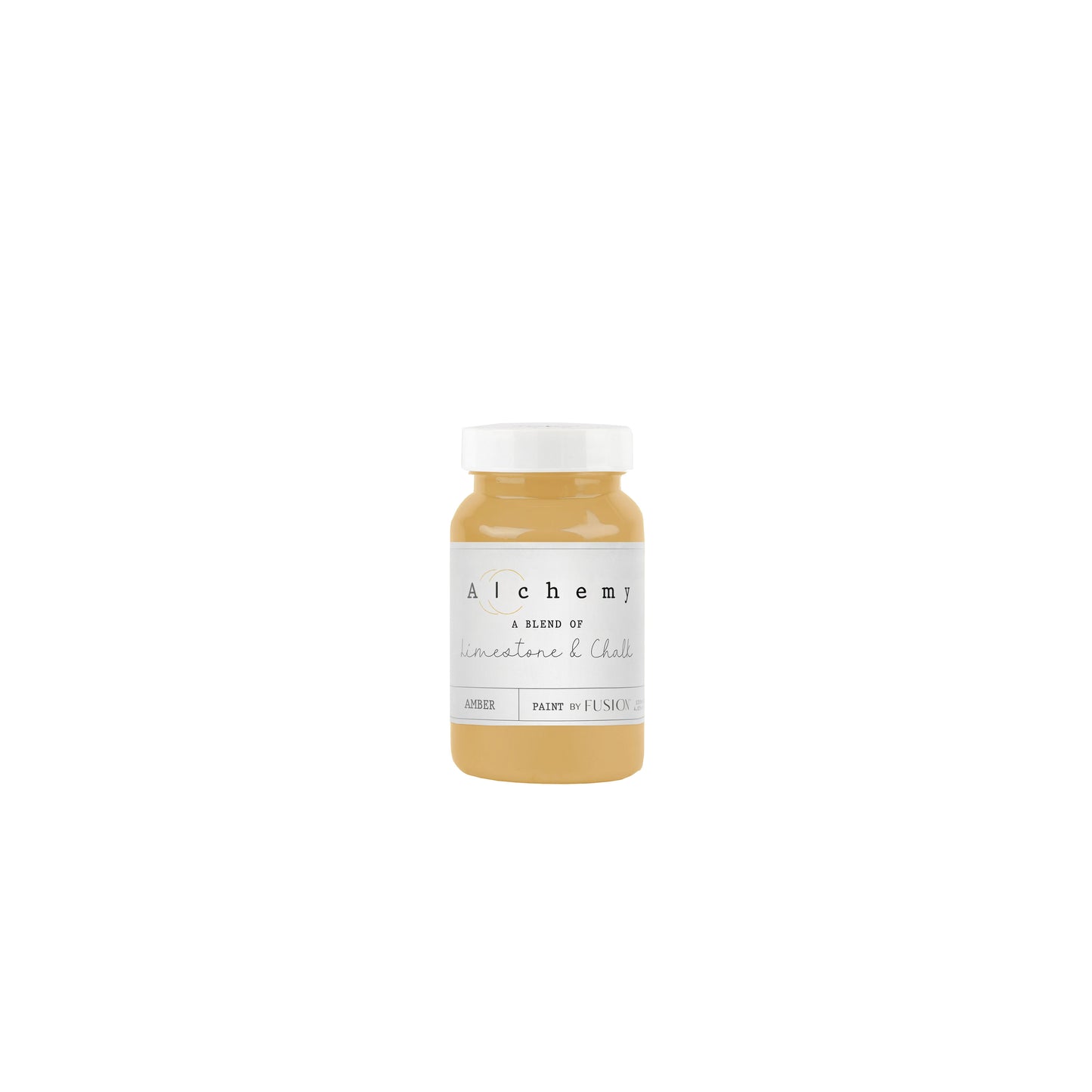 A jar of Alchemy by Fusion chalk paint in an amber color, with a label that includes the product name and the brand's logo.