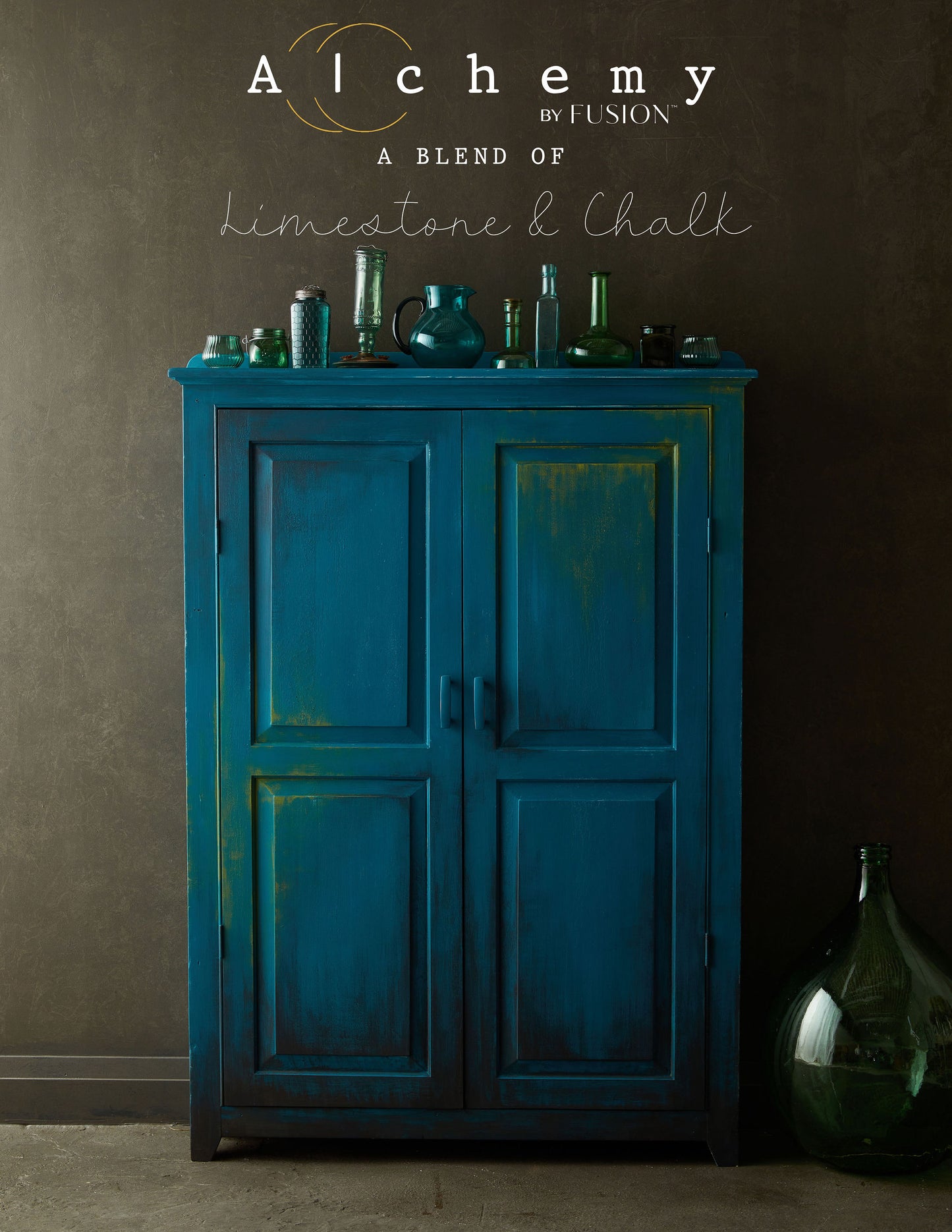 A jar of Alchemy by Fusion chalk paint in a lagoon color, which is a blend of green and blue.