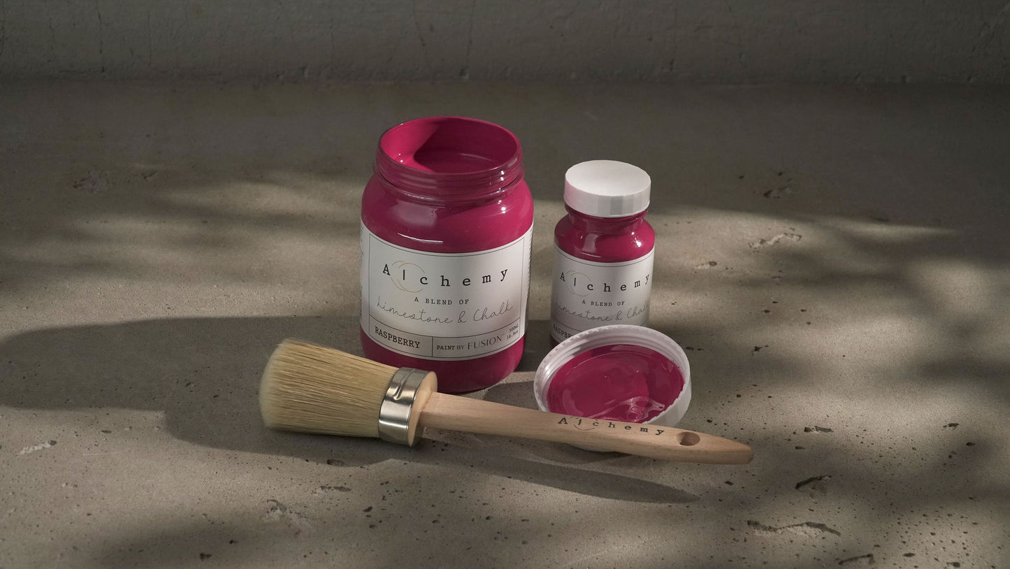 A jar of Alchemy by Fusion chalk paint in Raspberry color.