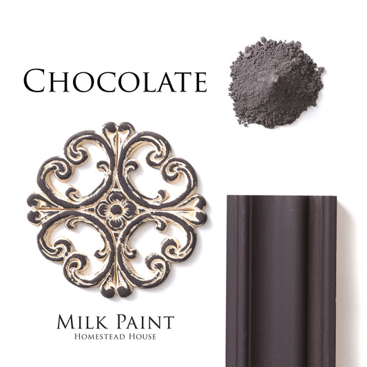 Homestead House Chocolate Milk Paint with decorative metal piece and paint swatch on a white background