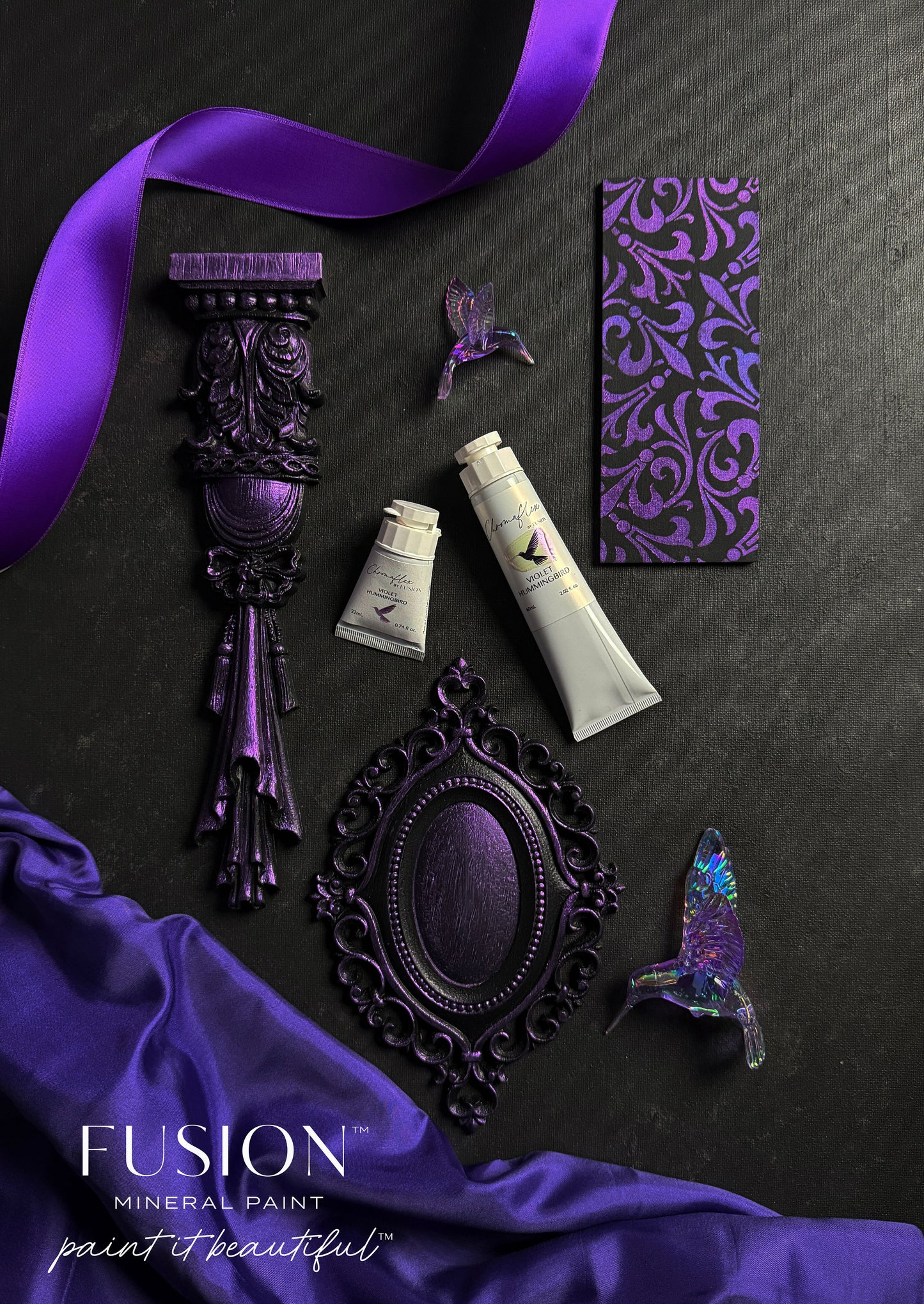 Purple decorative items and Fusion Mineral Paint on a dark surface
