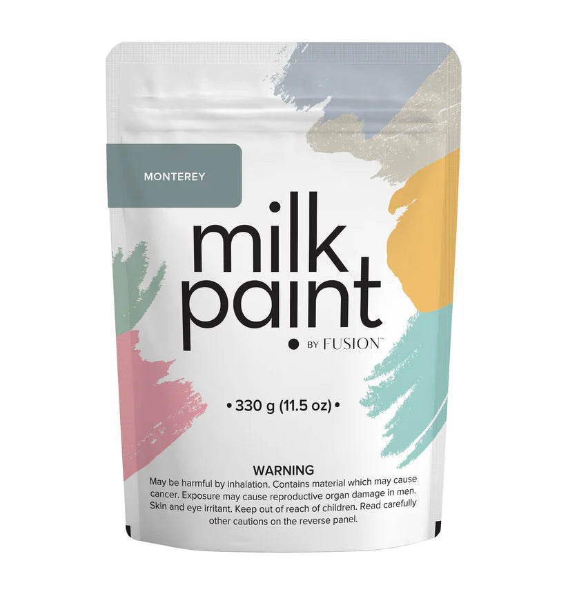 Packaging of milk paint by Fusion with colorful design on a white background