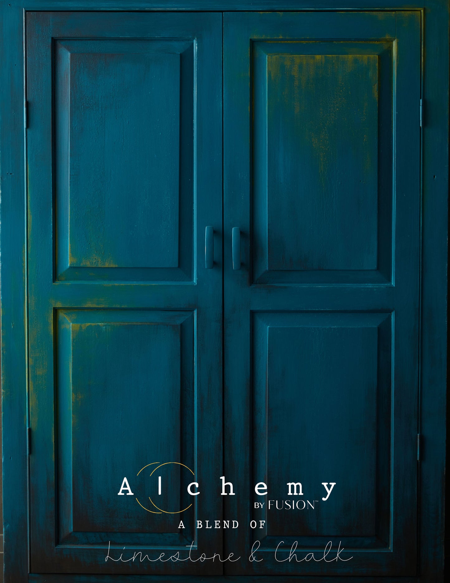 A jar of Alchemy by Fusion chalk paint in a lagoon color, which is a blend of green and blue.