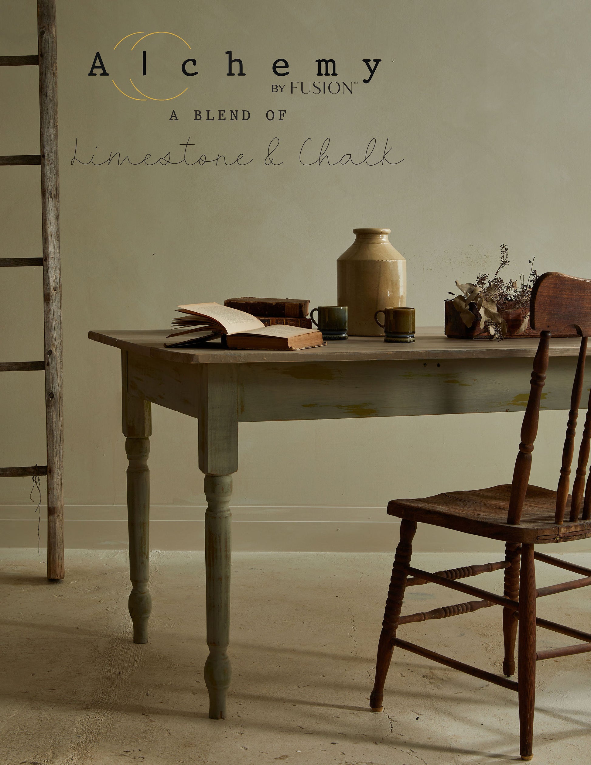 A jar of Alchemy by Fusion chalk paint in sage color, with a white label on the front.