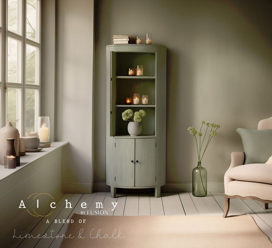 A jar of Alchemy by Fusion chalk paint in sage color, with a white label on the front.