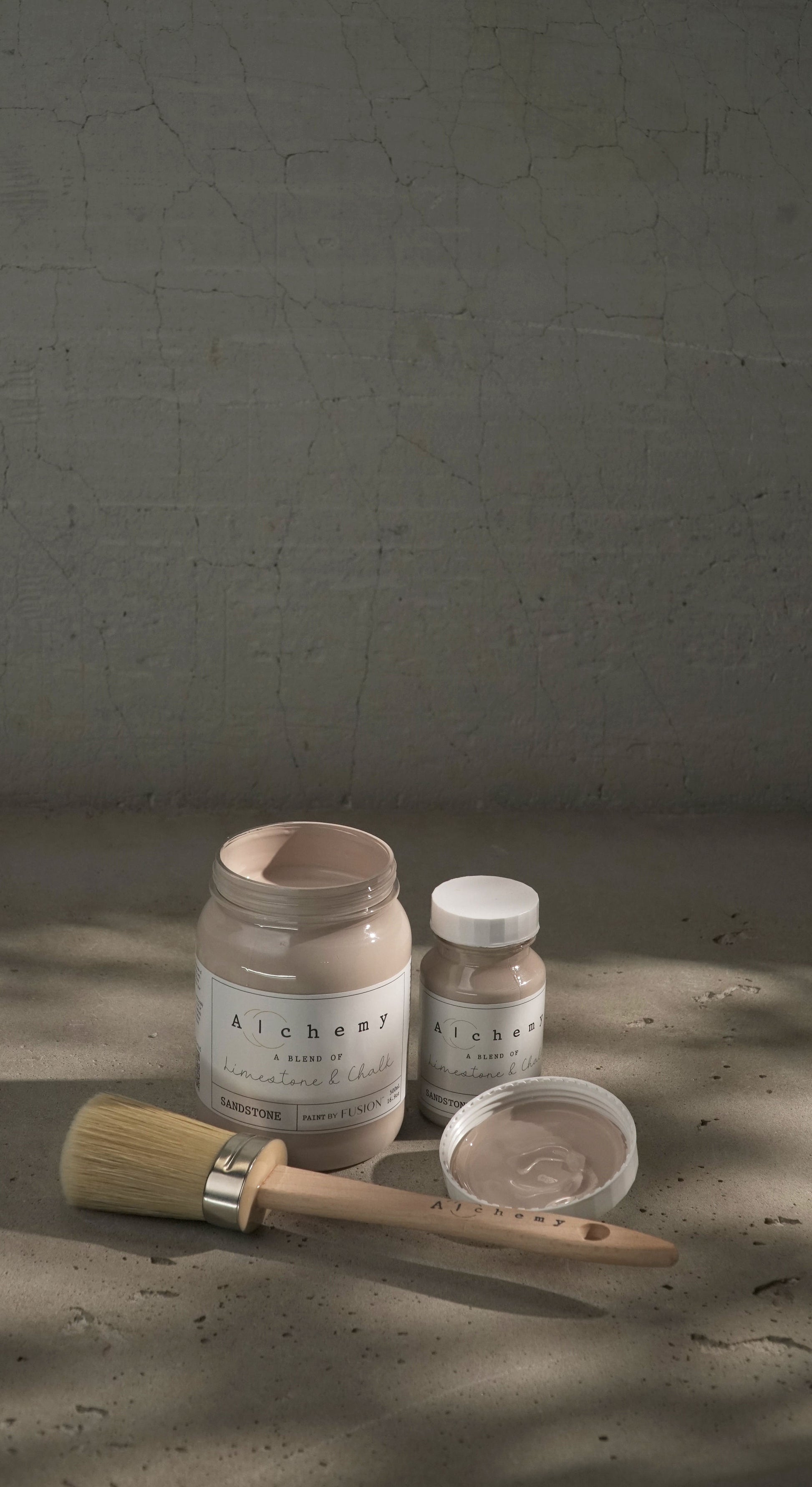 A jar of Alchemy by Fusion chalk paint in Sandstone color.