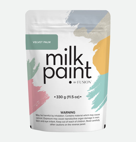 Package of milk paint by Fusion with colorful design on a white background