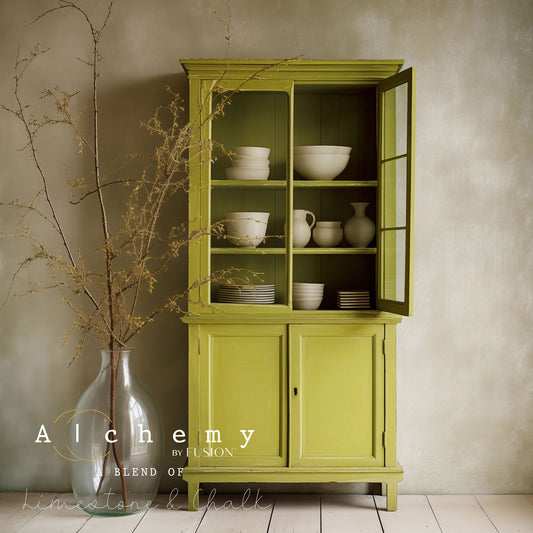 A jar of Alchemy by Fusion chalk paint in the color 'Willow', displaying the product label with white text on a yellow background.