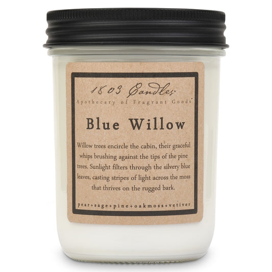 Candle jar labeled 'Blue Willow' with a descriptive label on a white background