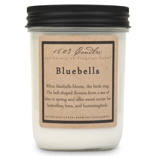 Candle with a label titled 'Bluebells' on a white background