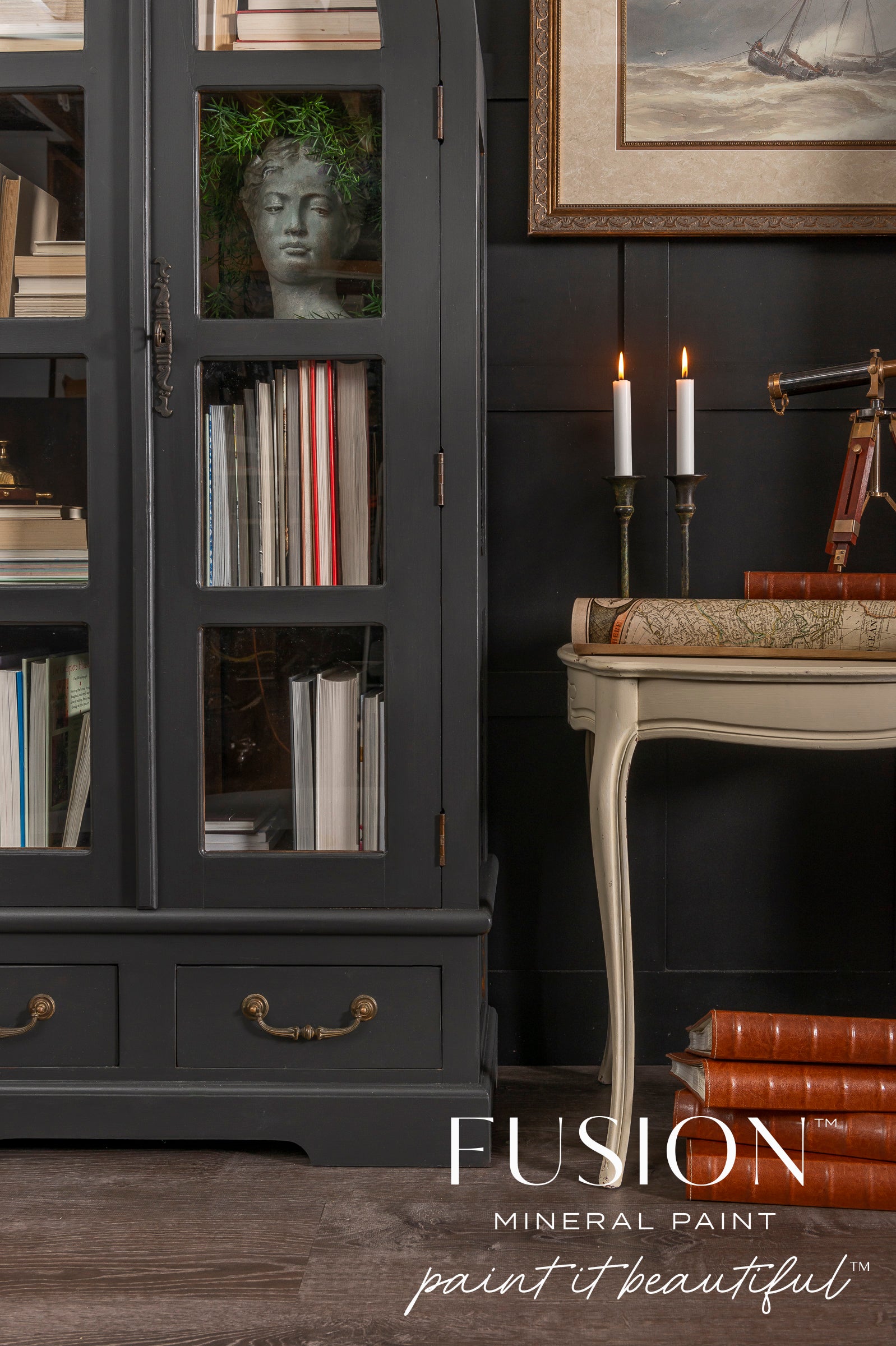Dark gray cabinet with books and decorative items, Fusion Mineral Paint logo visible