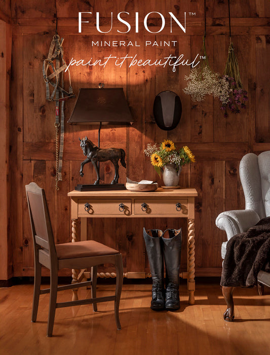 Room interior with wooden walls, furniture, and Fusion Mineral Paint branding.