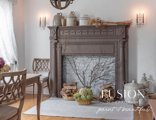 Decorative fireplace with Fusion Mineral Paint branding in a home setting.