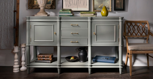 Gray sideboard with decorative items in a room setting