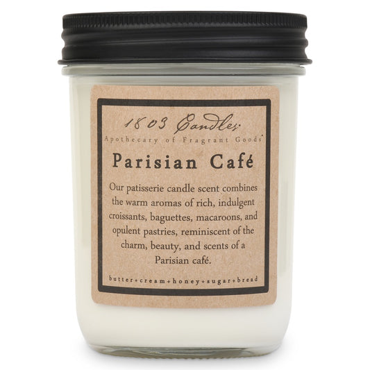 Candle with 'Parisian Café' label on a white background
