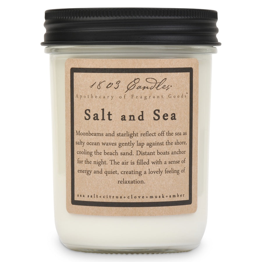 Candle with a label titled 'Salt and Sea' on a white background