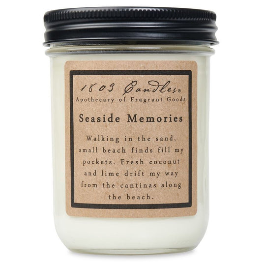 Candle jar labeled 'Seaside Memories' with a black lid on a white background